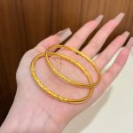 Gold patterned solid bracelet - Image 2