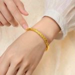 Gold patterned solid bracelet